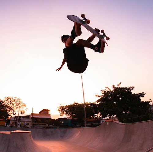 frontside air skateboarding out of a bowl